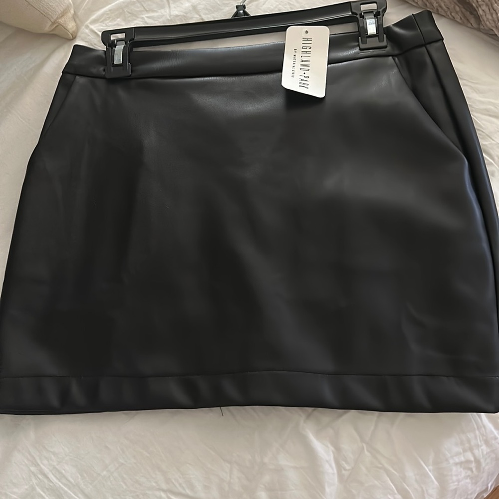 Black pleather miniskirt by Eighteen Muse. Size Medium